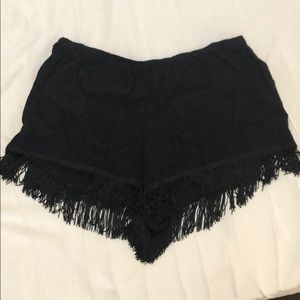 Show Me Your Mumu black fringe shorts